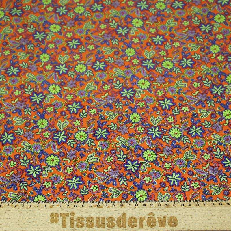 Étoffe 100% viscose - Fleur violette fond orange