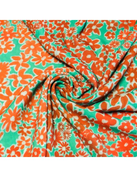 Étoffe 100% viscose - Fleur orange fond vert