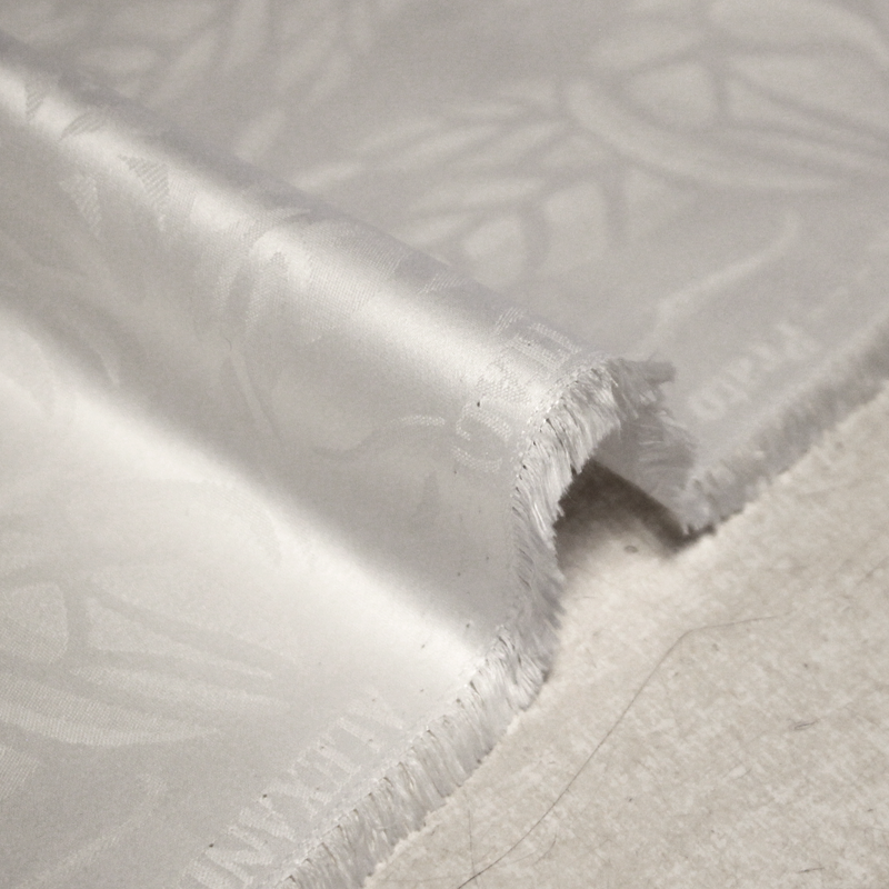 Popeline jacquard 100% coton - Motif abstrait blanc optique