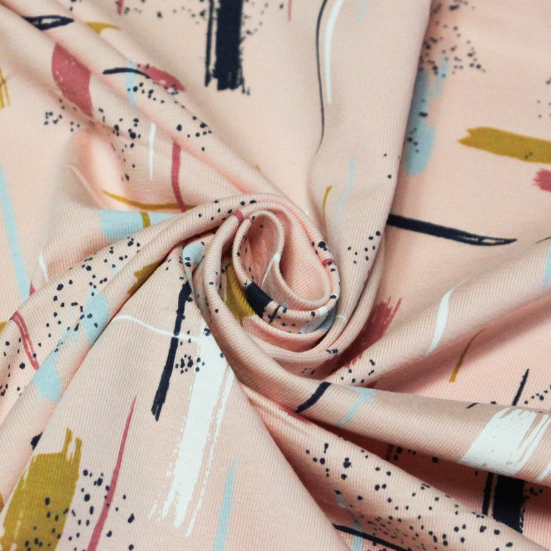 Jersey coton peigné & élasthanne - Trace colorée fond rose