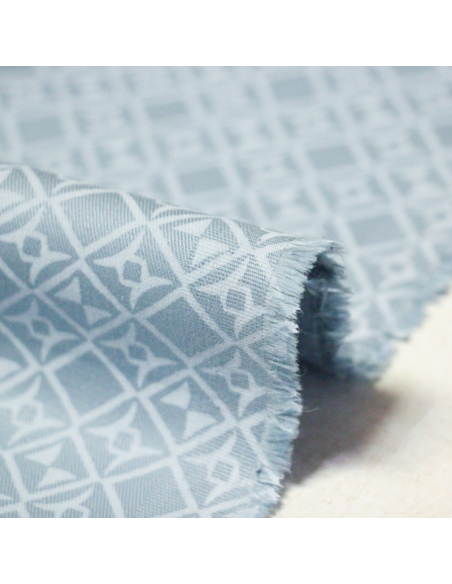 Gabardine coton & élasthanne - Motif géométrique fond bleu