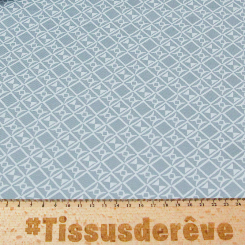 Gabardine coton & élasthanne - Motif géométrique fond bleu