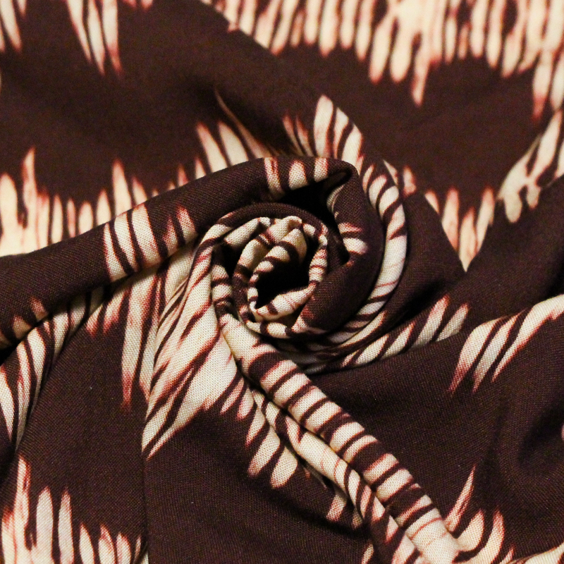 Étoffe 100% viscose - Onde blanche fond marron