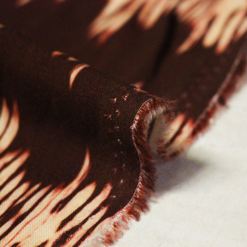 Étoffe 100% viscose - Onde blanche fond marron