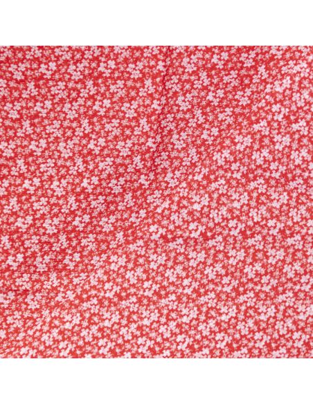 Mousseline crinkle 100% viscose – Fleurs blanches sur fond rouge