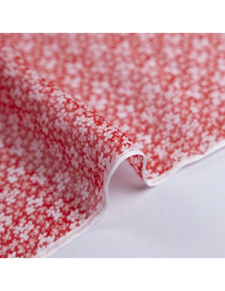 Mousseline crinkle 100% viscose – Fleurs blanches sur fond rouge