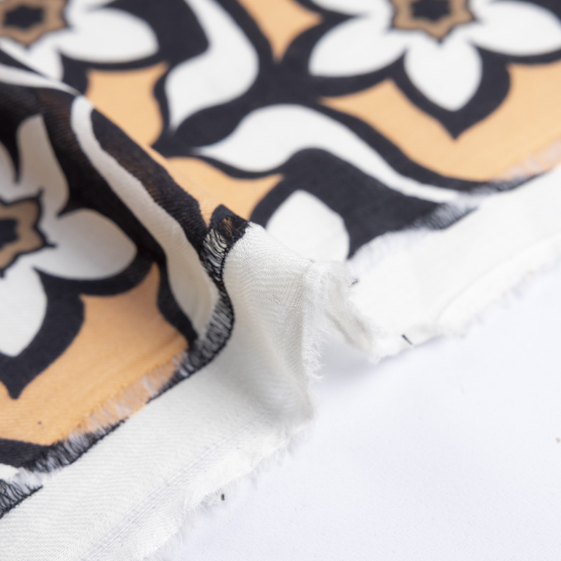Twill 100% laine - Fleurs graphiques orange & noir