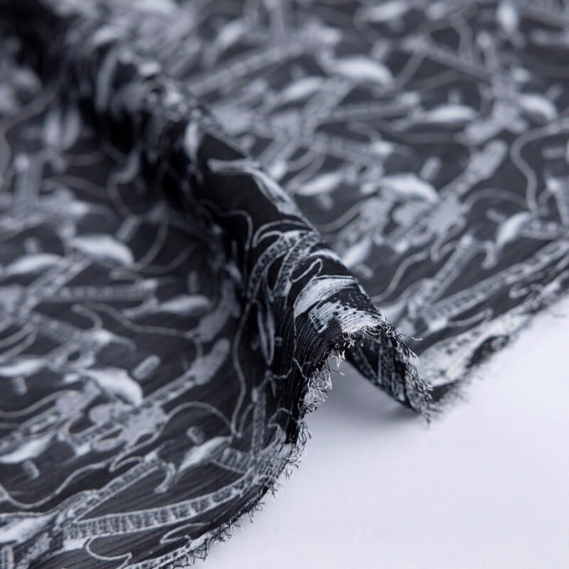 Mousseline crinkle – Guitares blanches fond noir