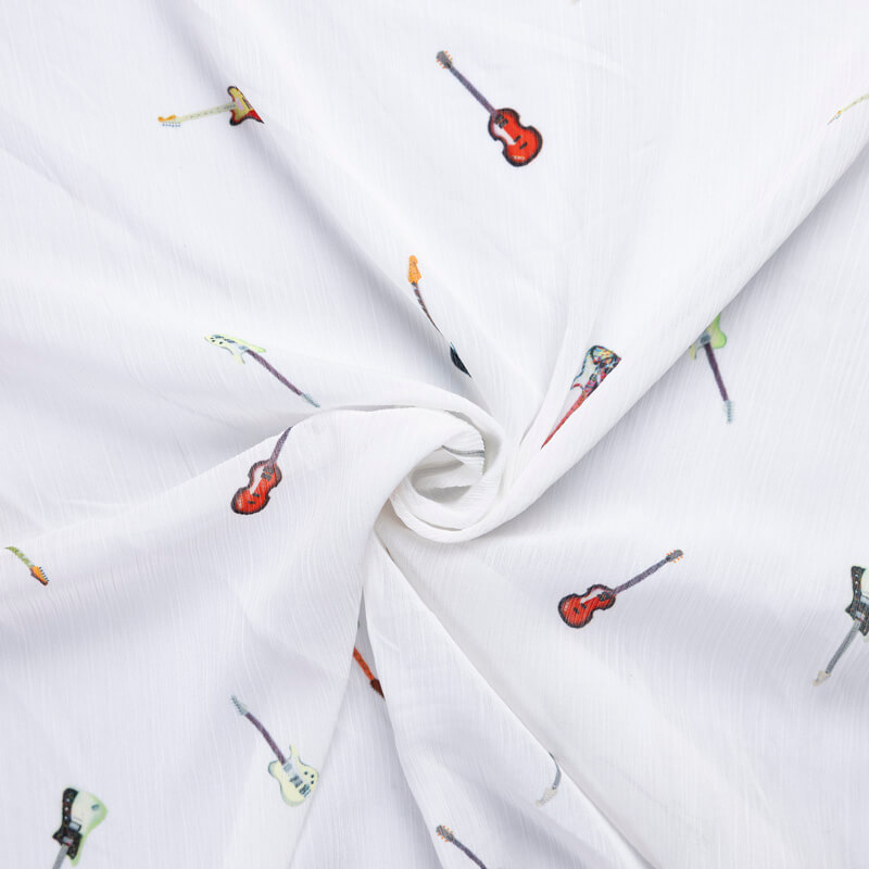 Mousseline crinkle – Guitares multicolores fond blanc
