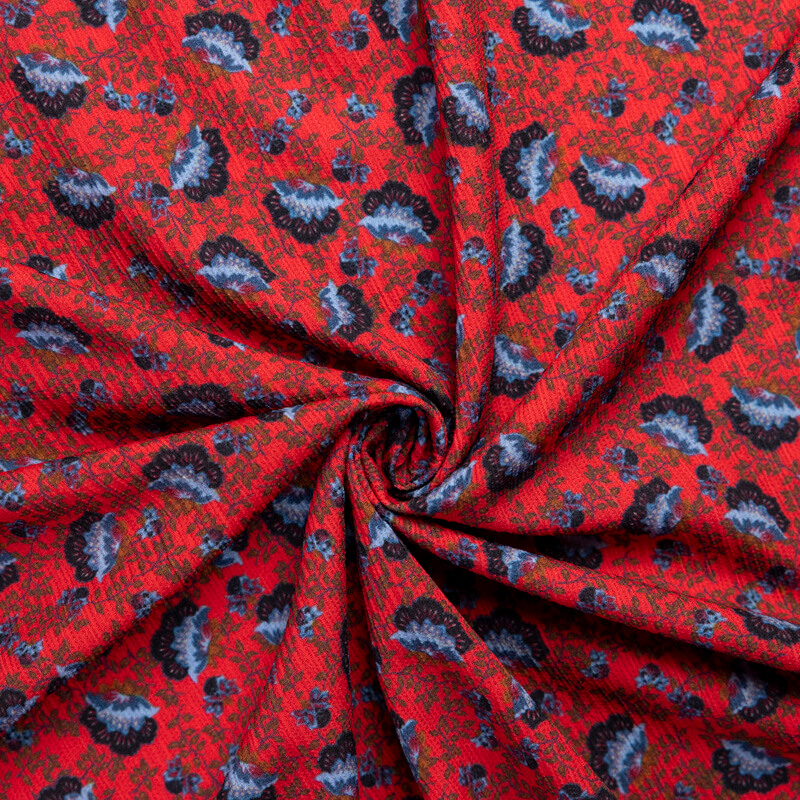 Crépon – Fleurs stylisées fond rouge