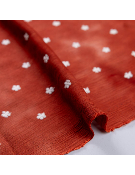 Crêpon 100% viscose – tie and dye terracotta brodée petites fleurs