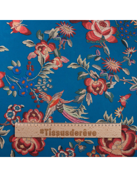 Crêpe imprimé - Fleurs et oiseau fond bleu